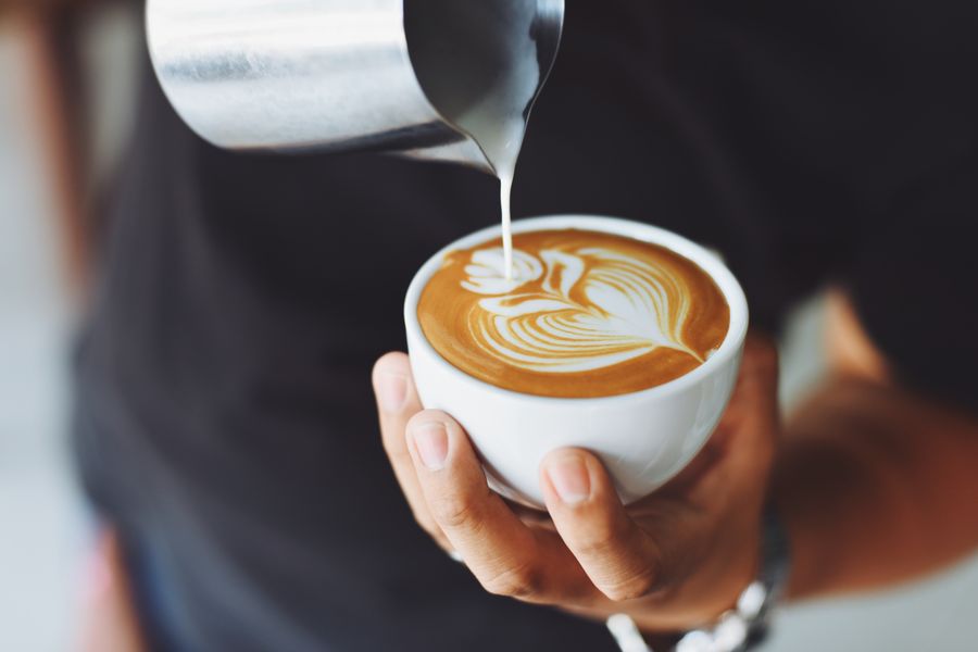 Kopi cup on a kopitiam table