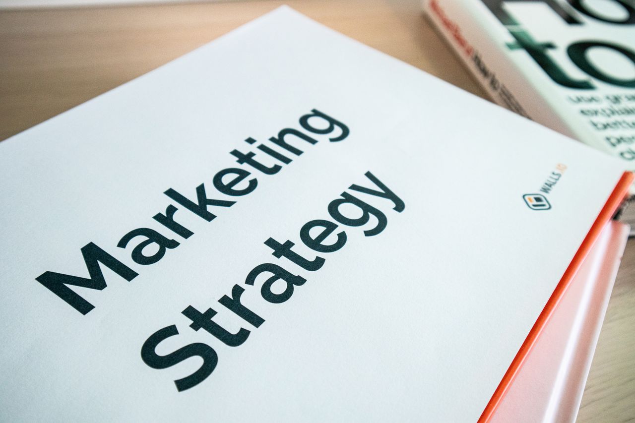 services-02 Close-up of a marketing strategy document on a desk, ideal for business content.